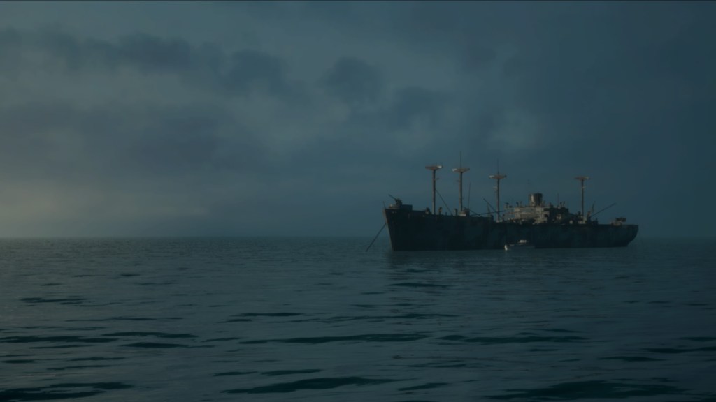 ghost ship floats on a calm sea